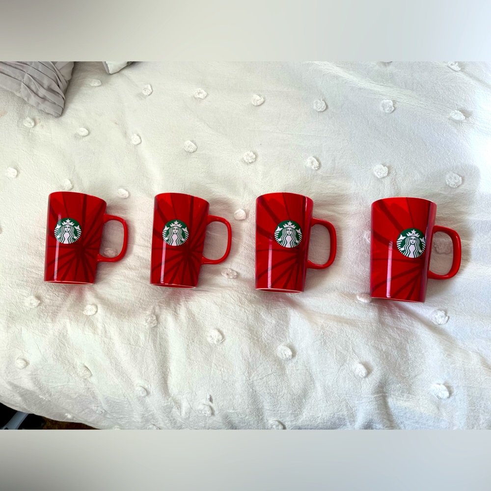 Set of 4 Starbucks holiday mugs